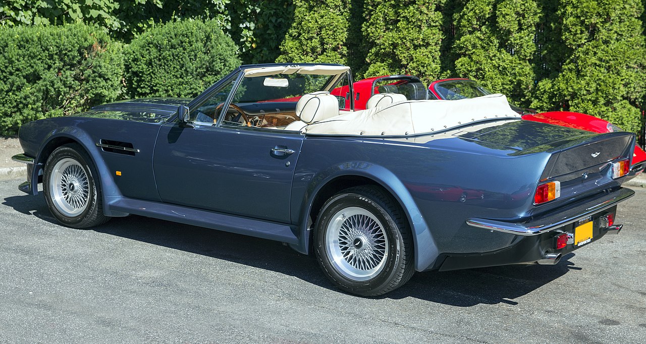 1990 Aston Martin V8 Vantage Volante, with the big wheelarches and sideskirts.