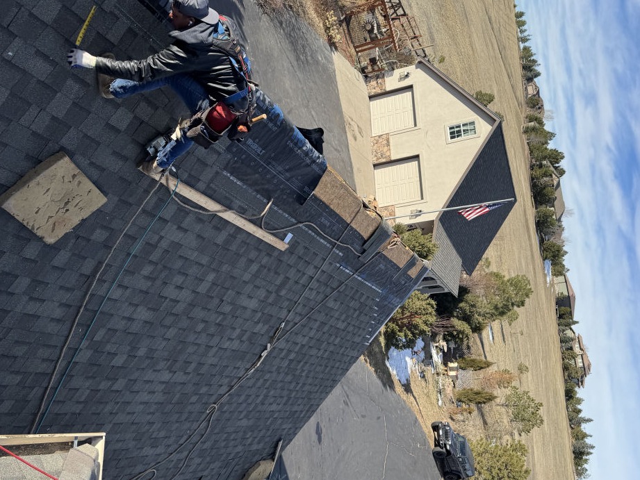 Local Denver roofing contractor replacing storm-damaged shingles – Cardenas Restoration