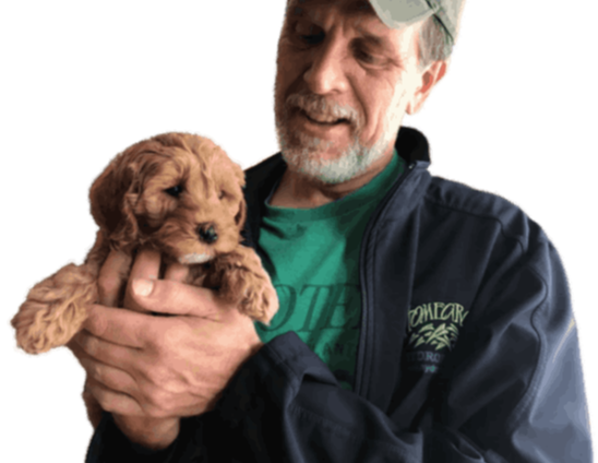 Chris holding his dog Myle