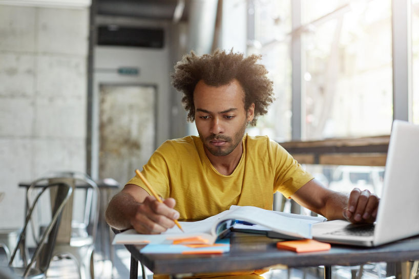 Kenyan SME owner working on business plan