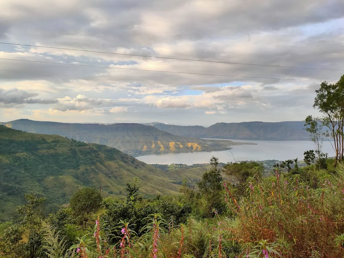 Scenic view of Mahabaleshwar showcasing lush green hills and serene landscapes, reflecting the mystical beauty of the destination.
