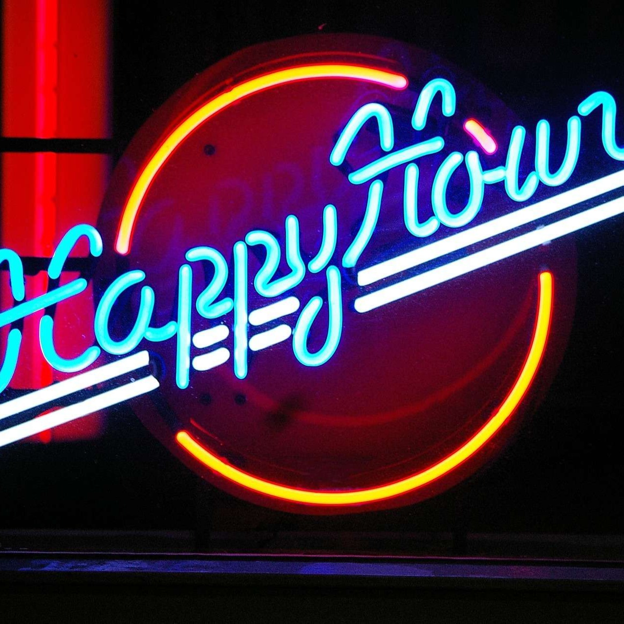 Happy Hour sign in Neon Lights